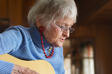 Woman playing guitar