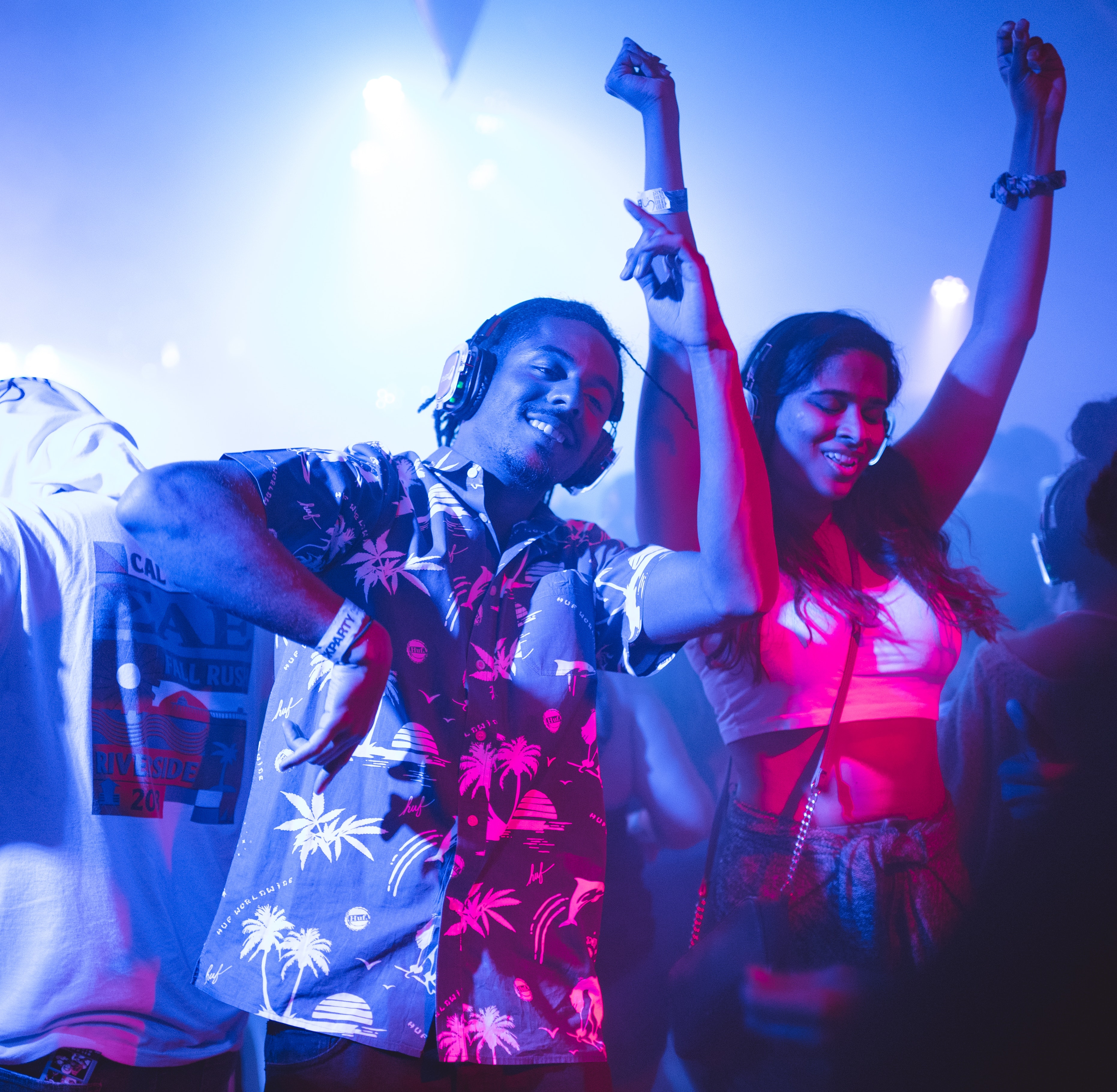 People dancing to music in a club