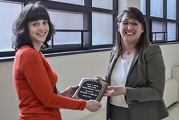 Michelle Hirsch receiving award