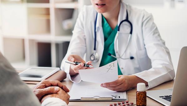 Image of doctor discussing a prescription with a patient