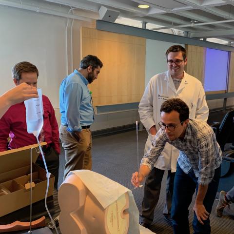 Neurology residents conduct lumbar puncture simulation Neurology residents conduct lumbar puncture simulation