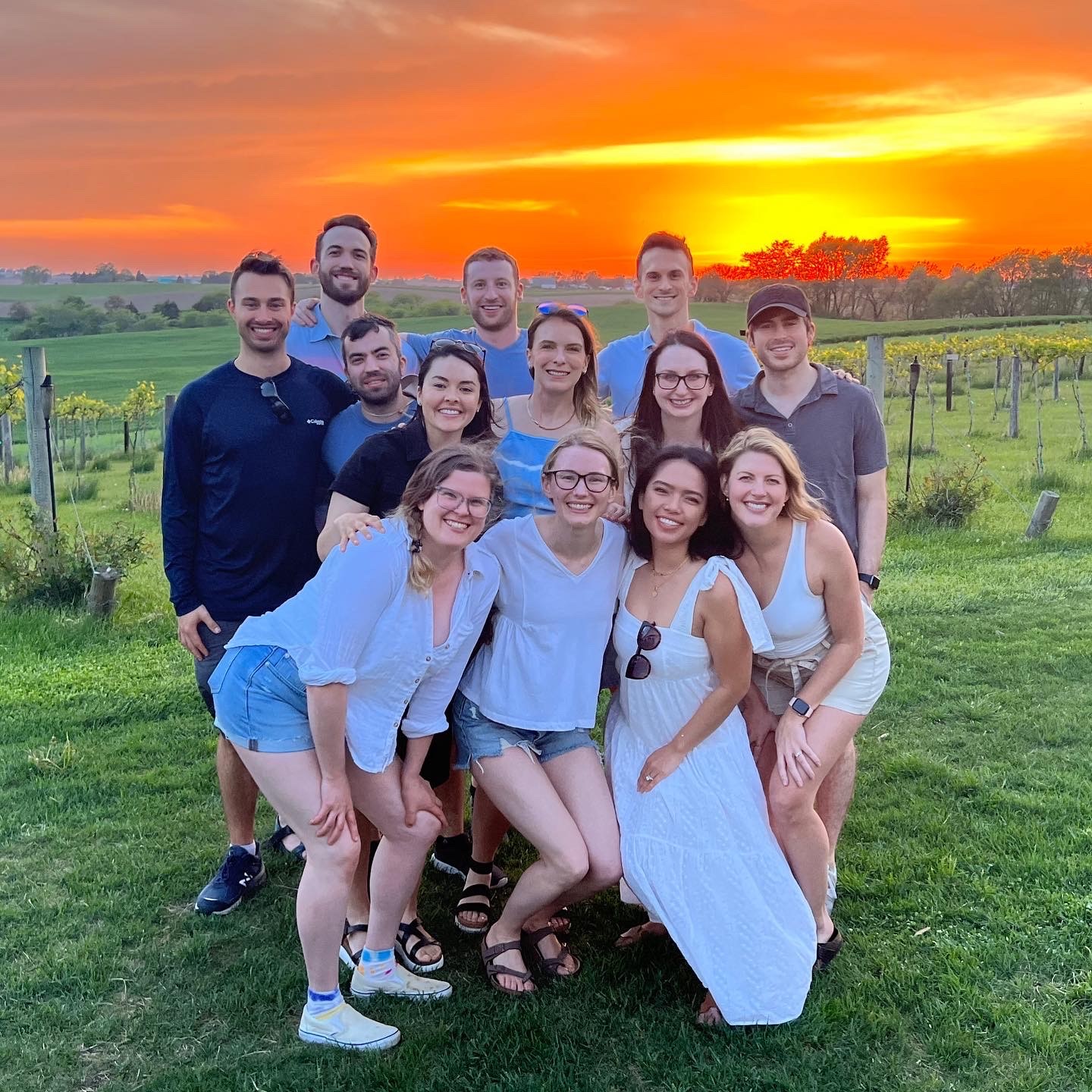 Dermatology 2022 group photo with sunset in the background