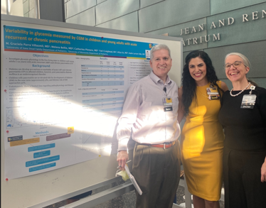 Graciela Parra Villasmil (center) Research Day with Dr. Michael Tansey Associate Program Director and Dr. Katie Larson Ode (Research Mentor) 